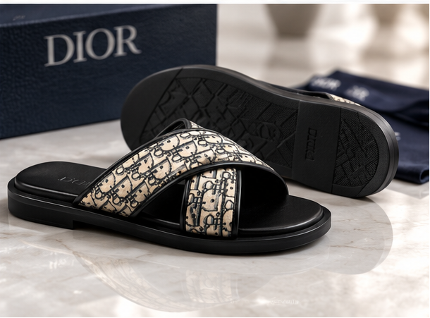 Dior sandals with logo pattern on a branded box and packaging.